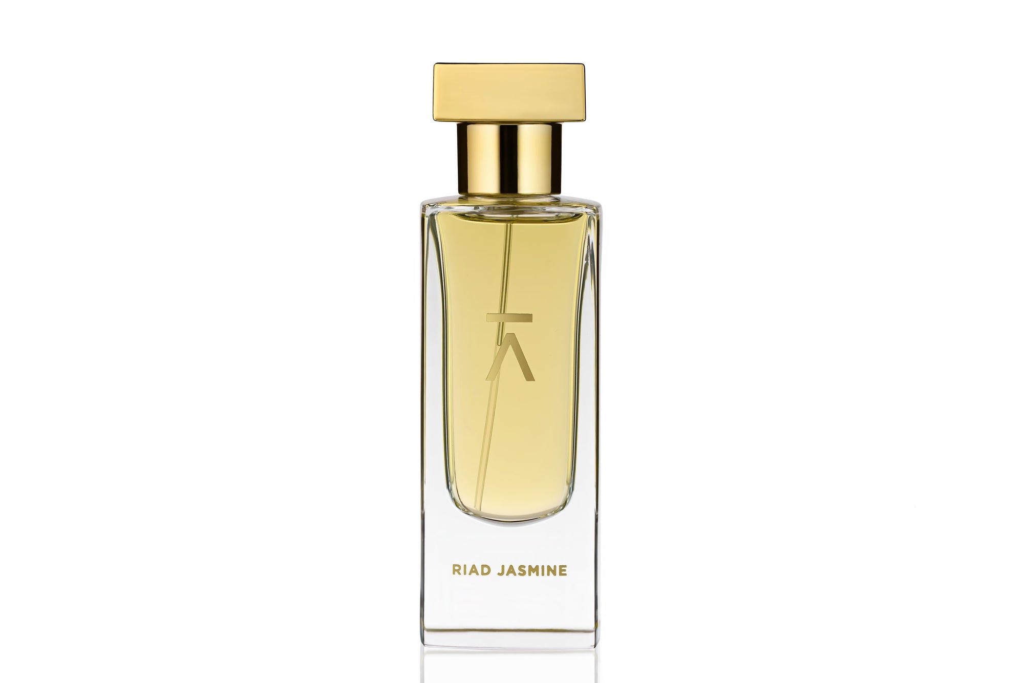 Studio photograph of a ‘Riad Jasmine’ perfume bottle by Azman Perfumes in collaboration with Chris Maurice, set against a white background. The bottle reflects a pale yellow, veggie, and mysterious aesthetic, highlighting elements such as berries, date, and oud.